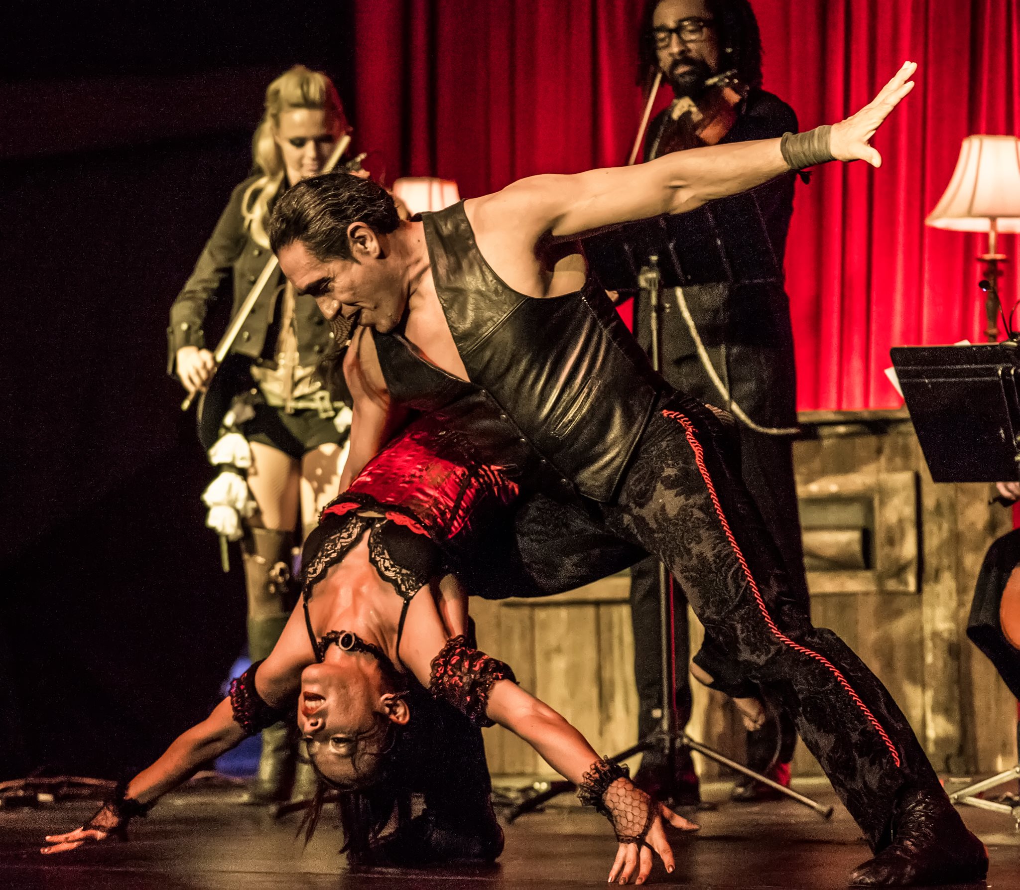 Image of Becca Feller and Miguel Balderrama performing at Vau de Vire's The Soiled Dove dinner theater Under the Tortona Big Top in Downtown Oakland